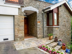 A small studio of a nature stone house